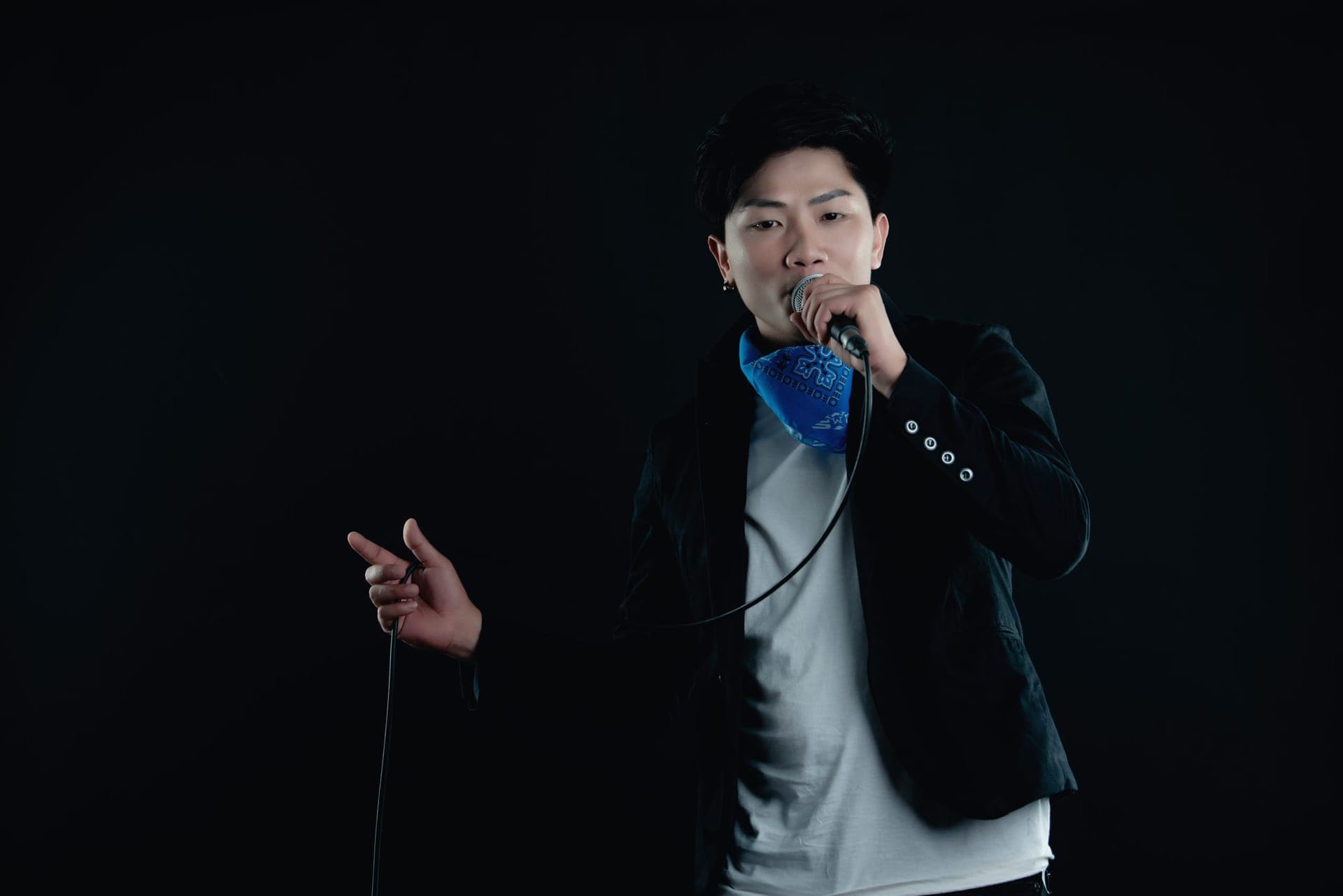 Professional Vietnamese voice actor recording in a broadcast-quality studio