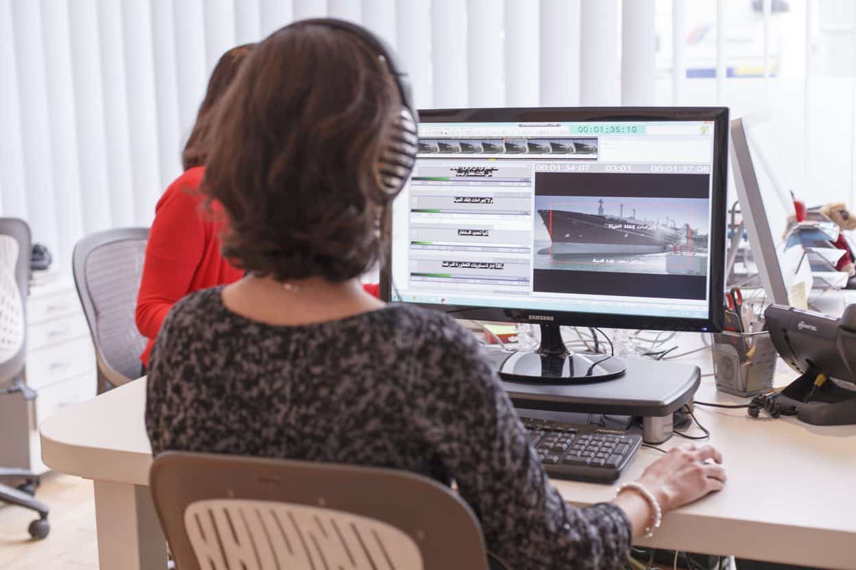 Subtitler timing Welsh subtitles against video in GoLocalise's London studio