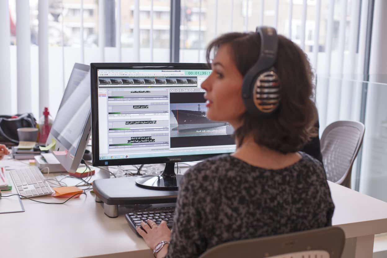 Subtitler timing Czech subtitles against video in GoLocalise's London studio