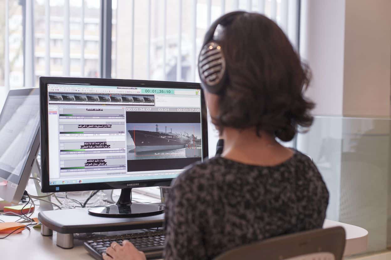 Subtitler timing Spanish subtitles against video in GoLocalise's London studio