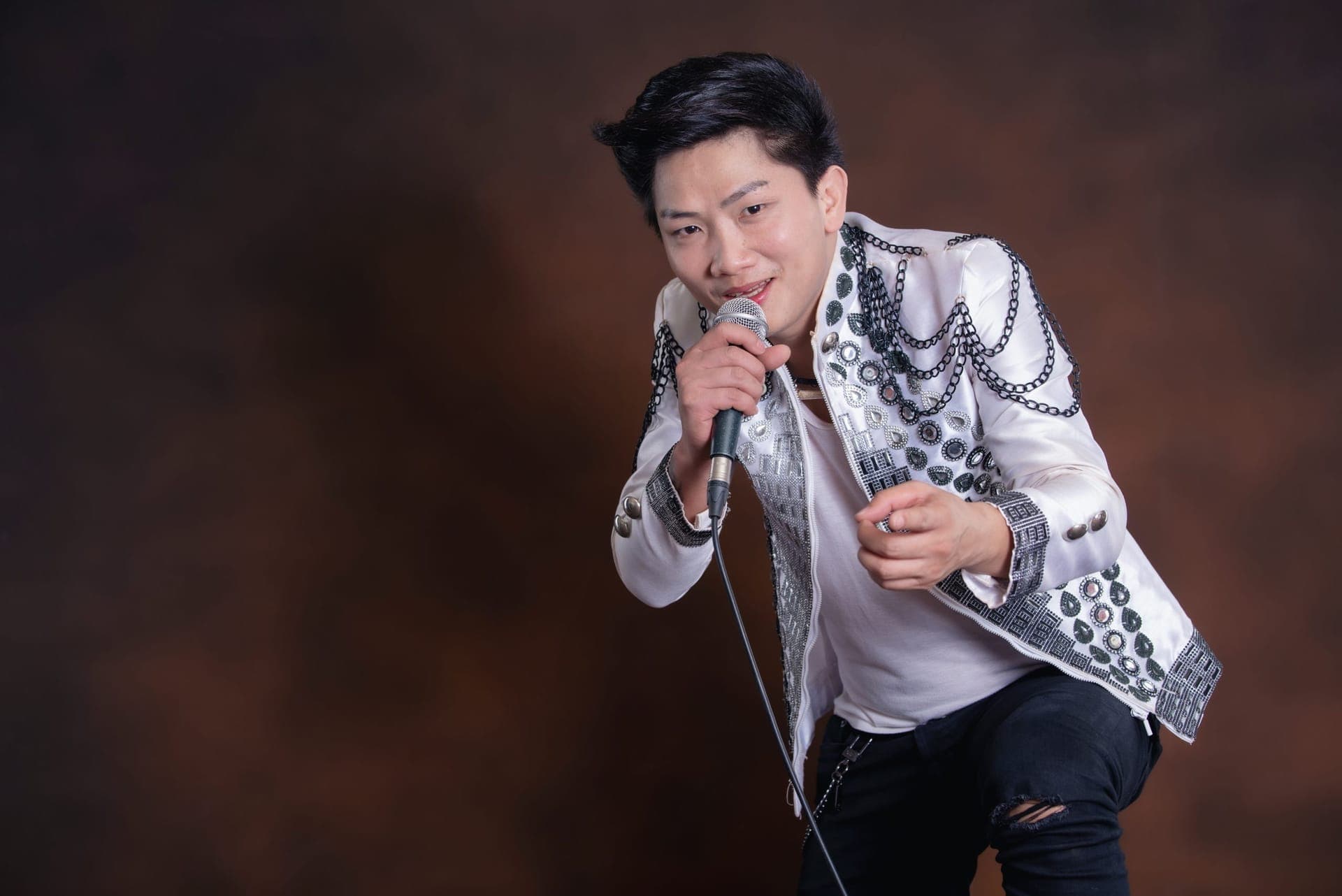 Asian voice over artist in studio