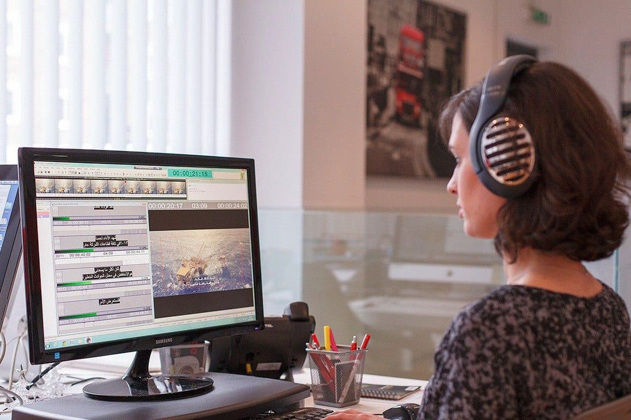 Subtitler timing Arabic subtitles against video in GoLocalise's London studio