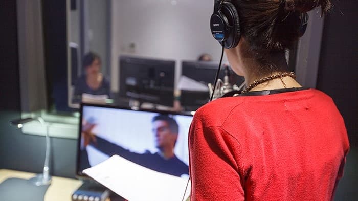 What is dubbing. Voice-over and dubbing artist at work at Golocalise Studio premises.