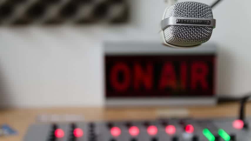 Recording studio microphone, console and on-air sign