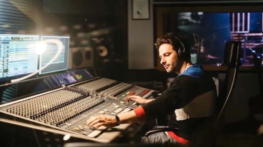 Image of a man in control of the recording studio to illustrate an article on ADR in Film and Animation Voice-Over. Photo by Tima Miroshnichenko on Pexels: https://www.pexels.com/photo/a-man-in-control-of-the-recording-studio-4988130/
