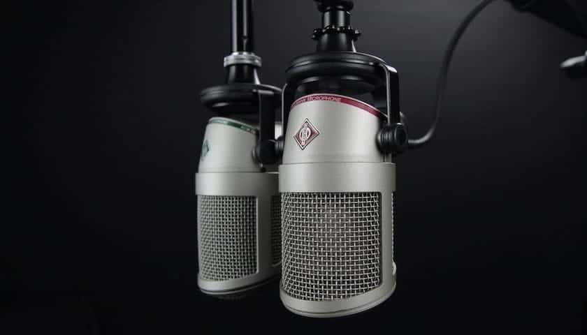 Image of a microphone on a black background to illustrate the article covering What Voice Over Microphones Are the Best?. Image from https://www.pexels.com/photo/aluminum-audio-battery-broadcast-270288/