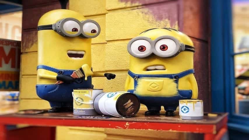 Cartoon Voice Over Jobs. Image of Two minions character figure on red table photo. This image is used to illustrate the article "Cartoon Voice Over Jobs: Your Path to Animation Stardom." UnSplash license: https://unsplash.com/photos/tloFnD-7EpI