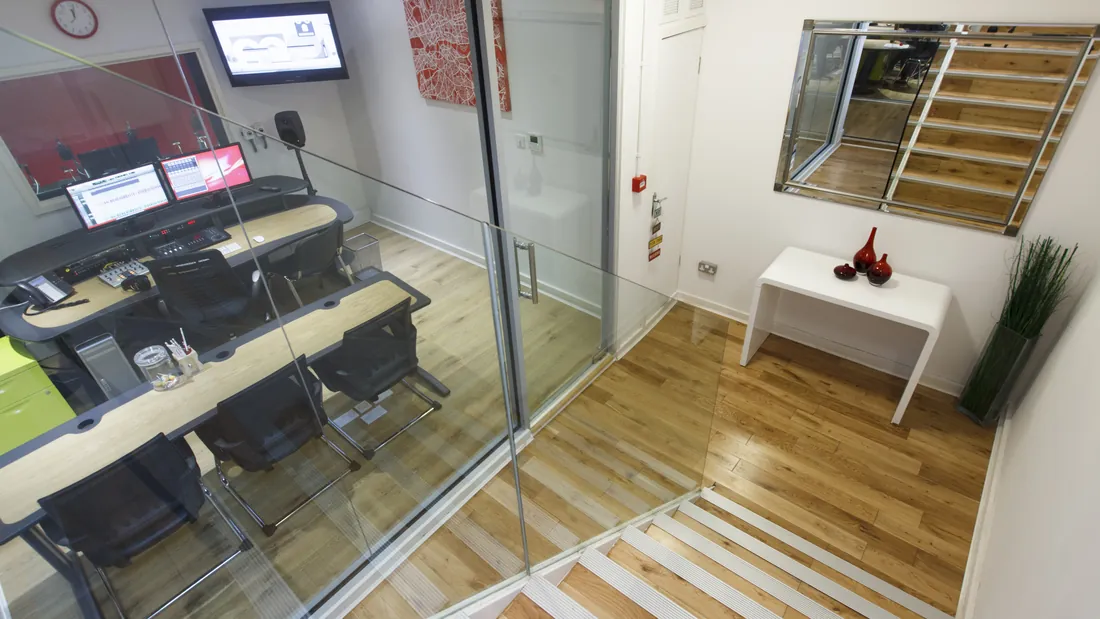 Red Studio seen through the glass from the GoLocalise stairwell