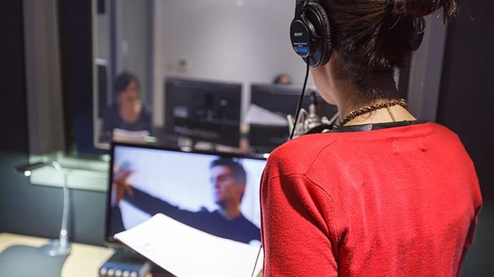 What is dubbing. Voice-over and dubbing artist at work at Golocalise Studio premises.