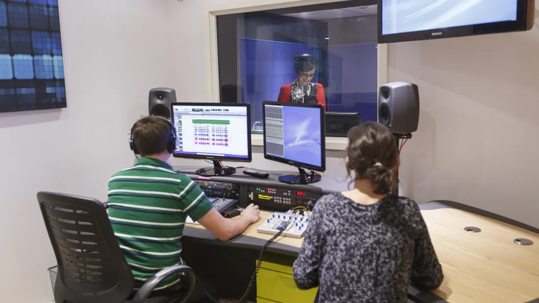 Sound engineer running an ADR session from the control desk