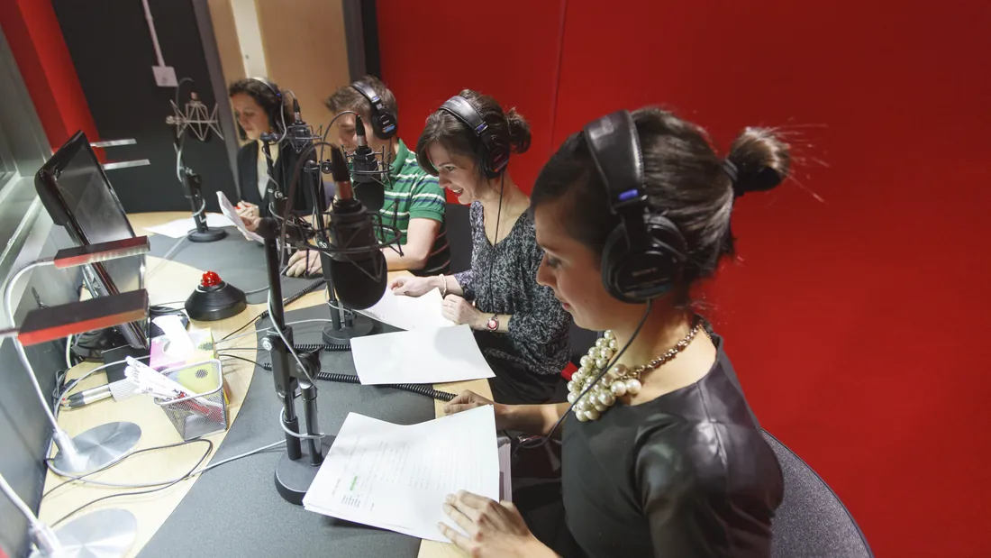 Native voice cast recording a dubbed scene in the Red Studio