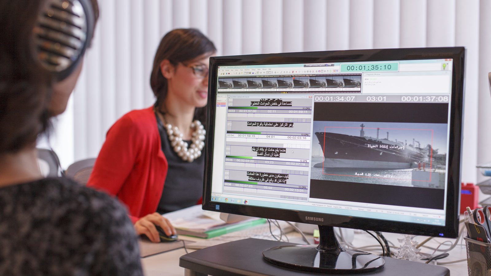 Subtitler timing and spotting subtitles against video in GoLocalise's London studio
